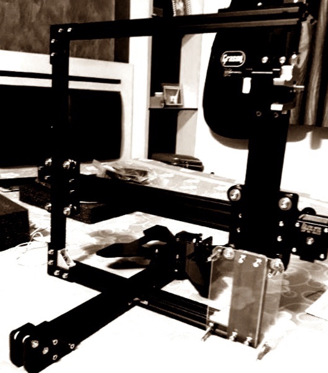 DIY 3D printer during setup and early print tests